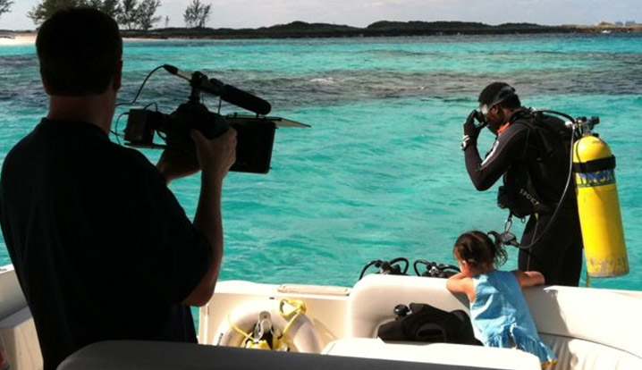 Bottom Line photographer filming scuba company for promo shoot.